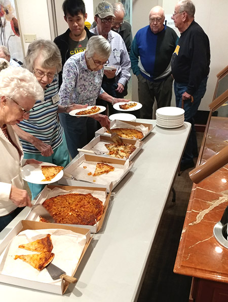 residents getting pizza