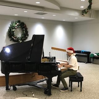 Nathaniel Zhu playing piano