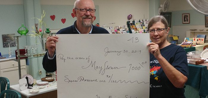 Bonnie presenting the “check” to Mayflower Executive Director, Steve Langerud.