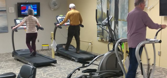 Pollak and Herman exercising in the Obermiller Center