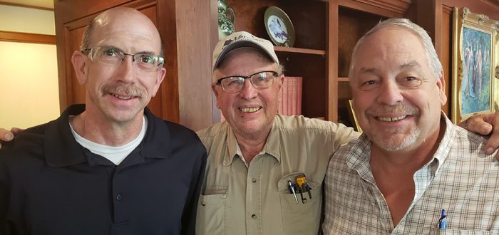 Kenny Steffens joined by Scott Gruhn and Jack Morrison at his retirement party