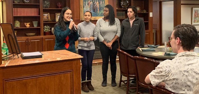The photo of the four students includes, left to right, Priyanka Dangol, Prajita Niraula, Hallela Hinton-Williams, and Mercedes Varela.