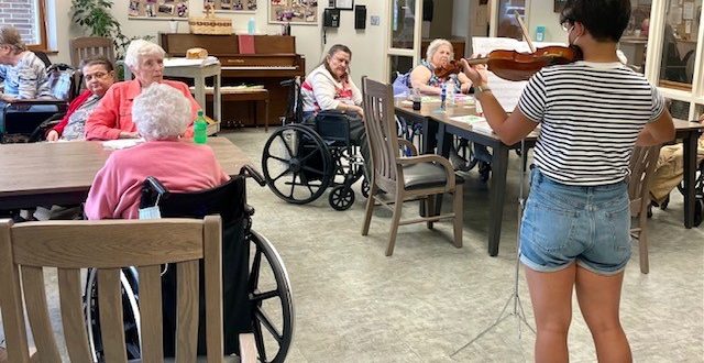 Grinnell College students play for residents