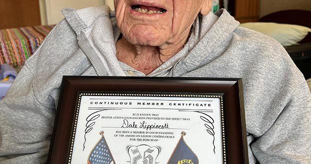 Dale Lippincott with American Legion plaque
