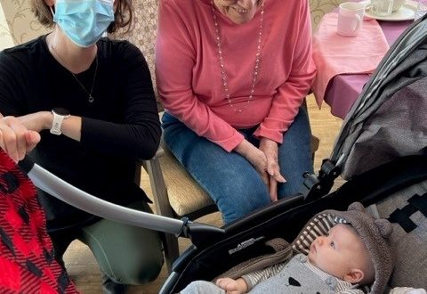 Jessica and baby Finley Hasenyager visit Mayflower residents